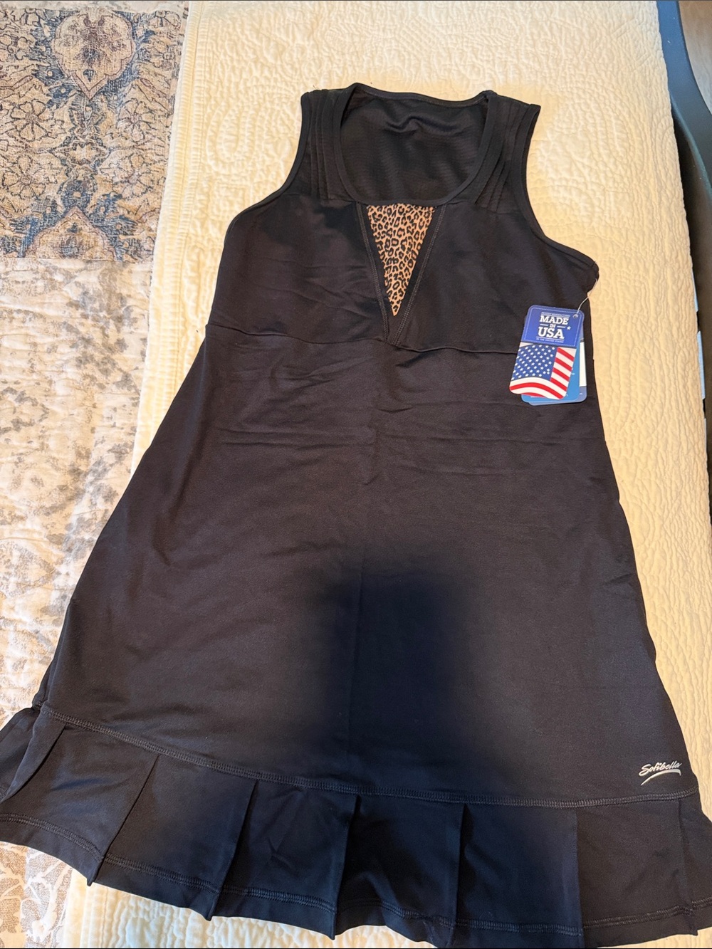 Women’s Black One-Piece Tennis Dress with Leopard Trim, built in shelf bra.